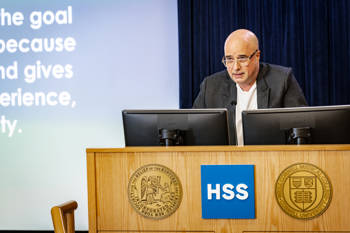 Andreas Dracopoulos, co-president of the Stavros Niarchos Foundation, gives a speech on the podium during the Hospital for Special Surgery -Stavros Niarchos Foundation Orthopedic Seminar Program.
